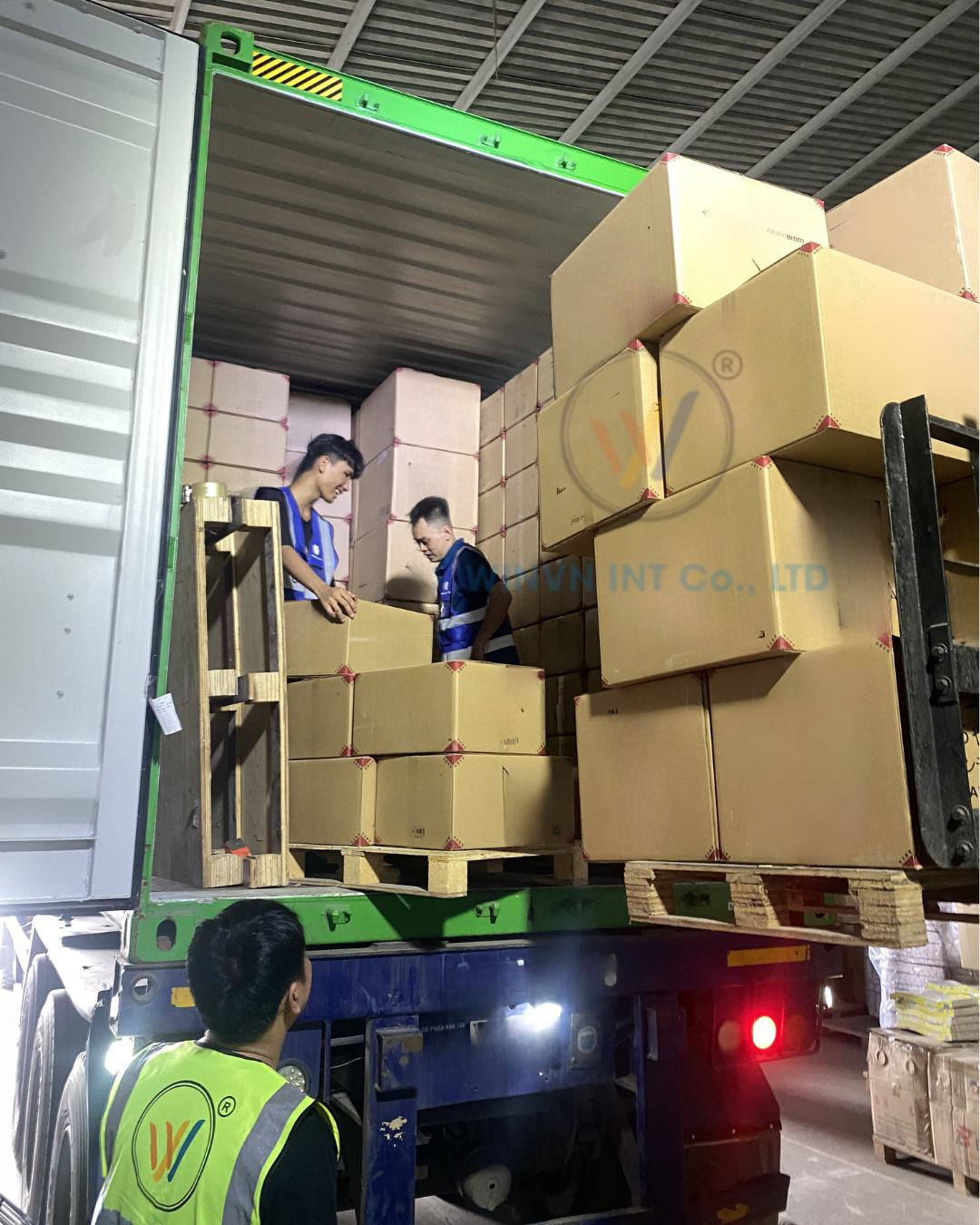 Loading export cartons into container — WINVN INT Co., LTD